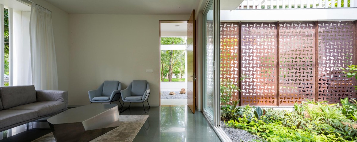 Living room of The Regimented House by LIJO.RENY.architects