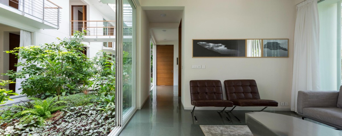 Living room of The Regimented House by LIJO.RENY.architects