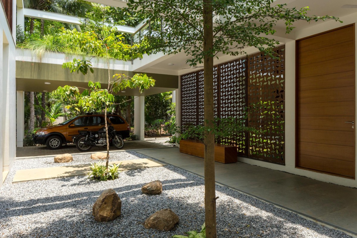 External Court and Patio of The Regimented House by LIJO.RENY.architects