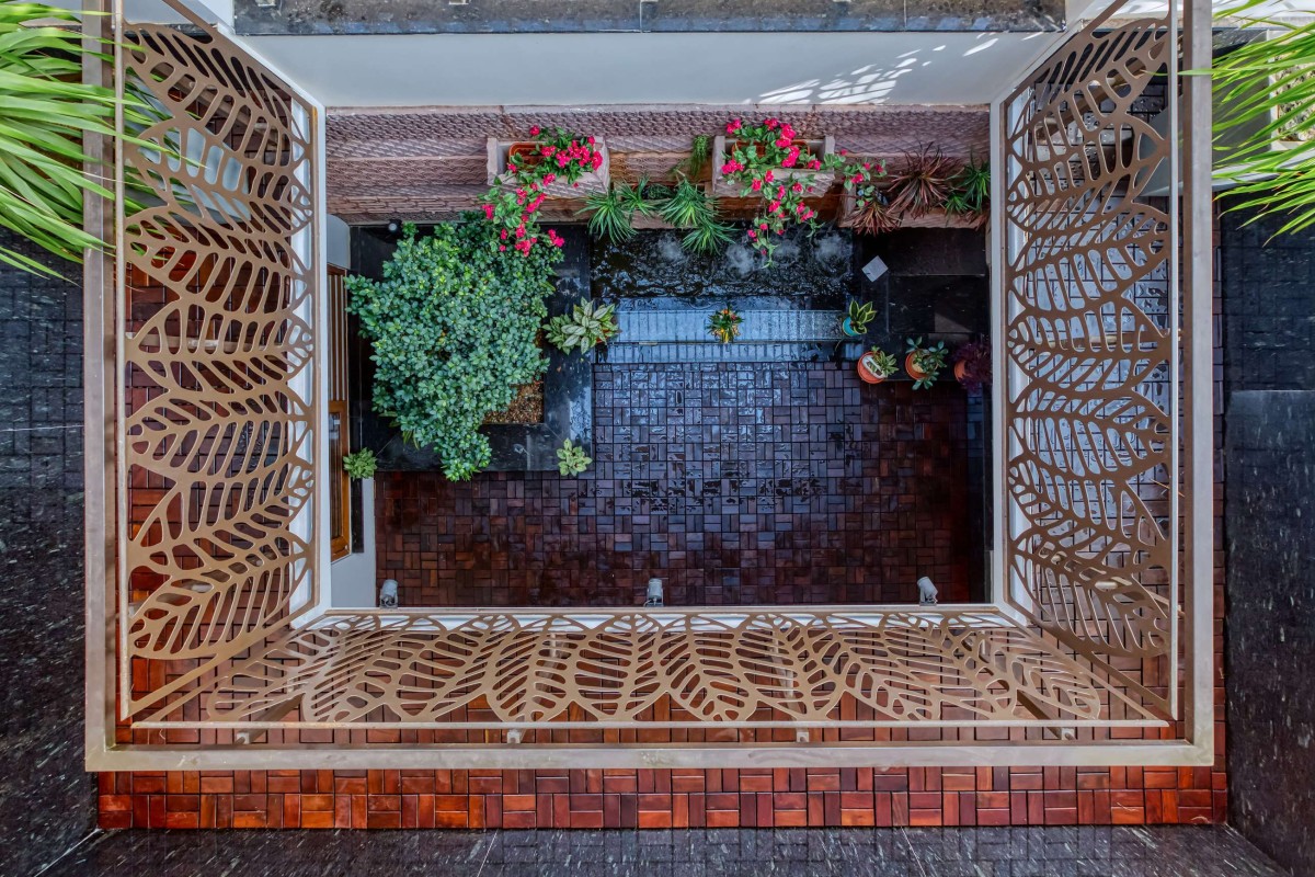 View of rain court from first floor of A Home by the Park by 4site Architects