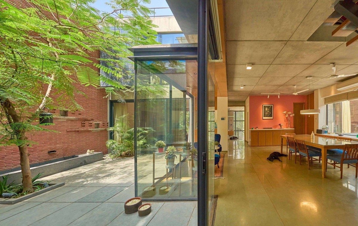 Dining and Courtyard view of House of Courts by DADA & Partners