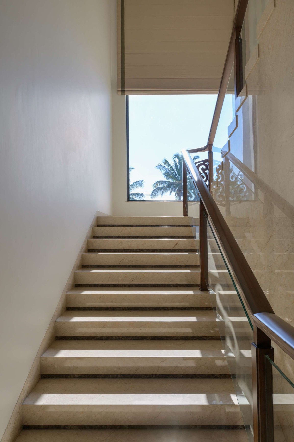 Staircase of Pushpa House by Ecumene Habitat Solutions Pvt. Ltd.