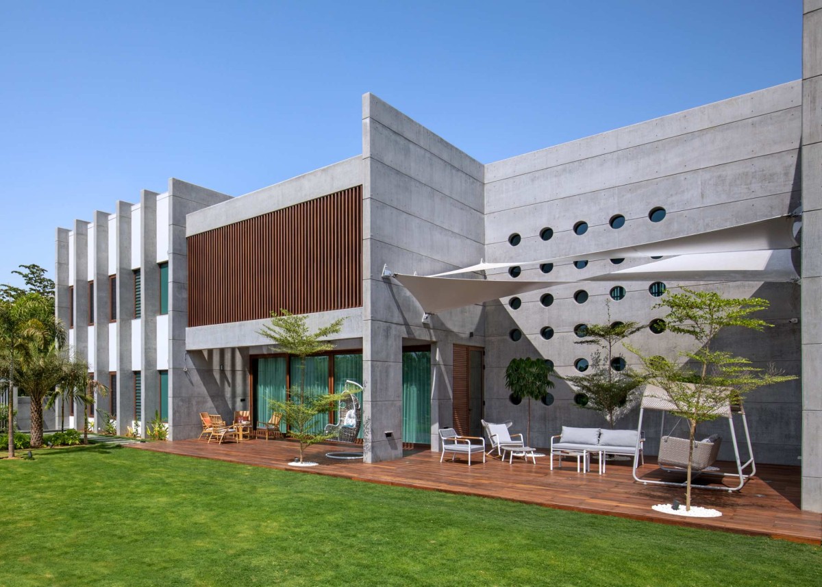 Back side elevation of Ankit Shah Residence by Dipen Gada & Associates