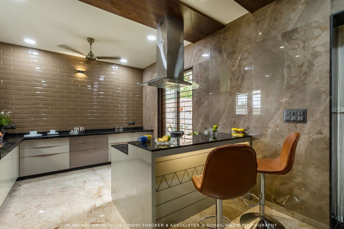 Kitchen of Pujara House by Flamingo Architects + Nidhi Thacker and Associates