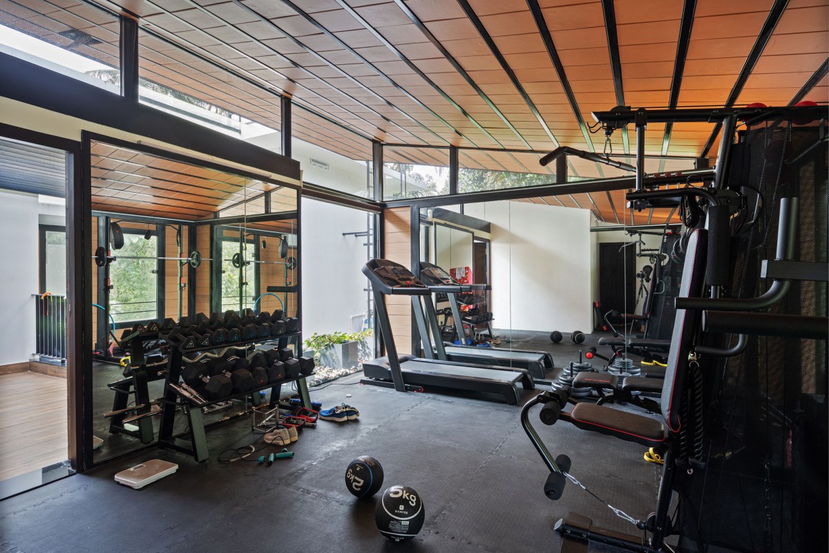 Gym of The Frangipani House by Designature Architects