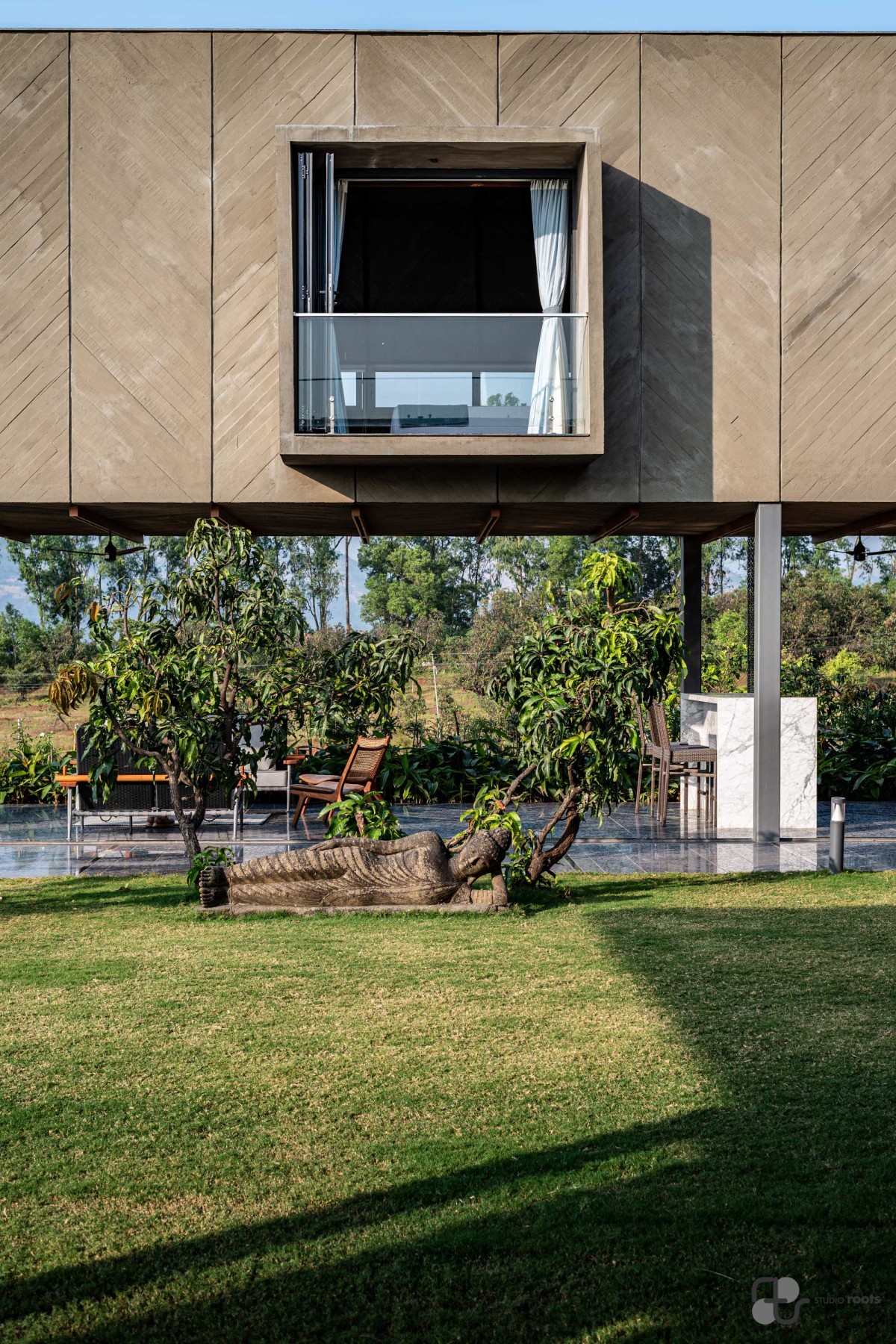 Entrance court of Blurring the Boundaries Weekend Home at Maale by Studio Roots