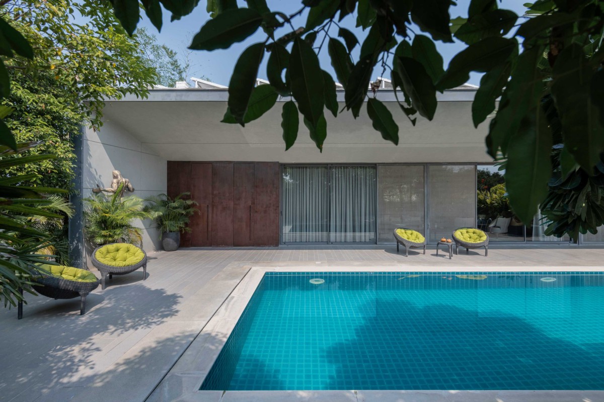 Swimming pool view of House Of Greys by ADND