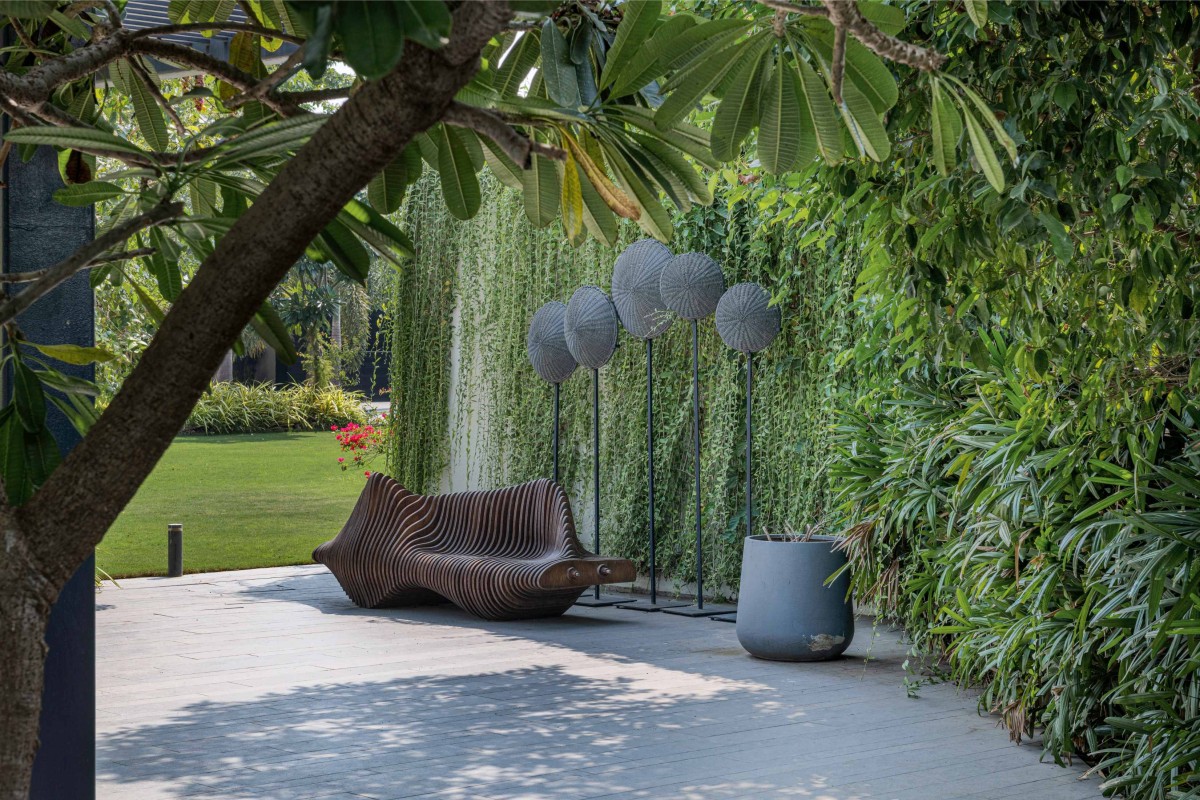 Parametric outdoor bench and series of rattan outdoor floor lights of House Of Greys by ADND