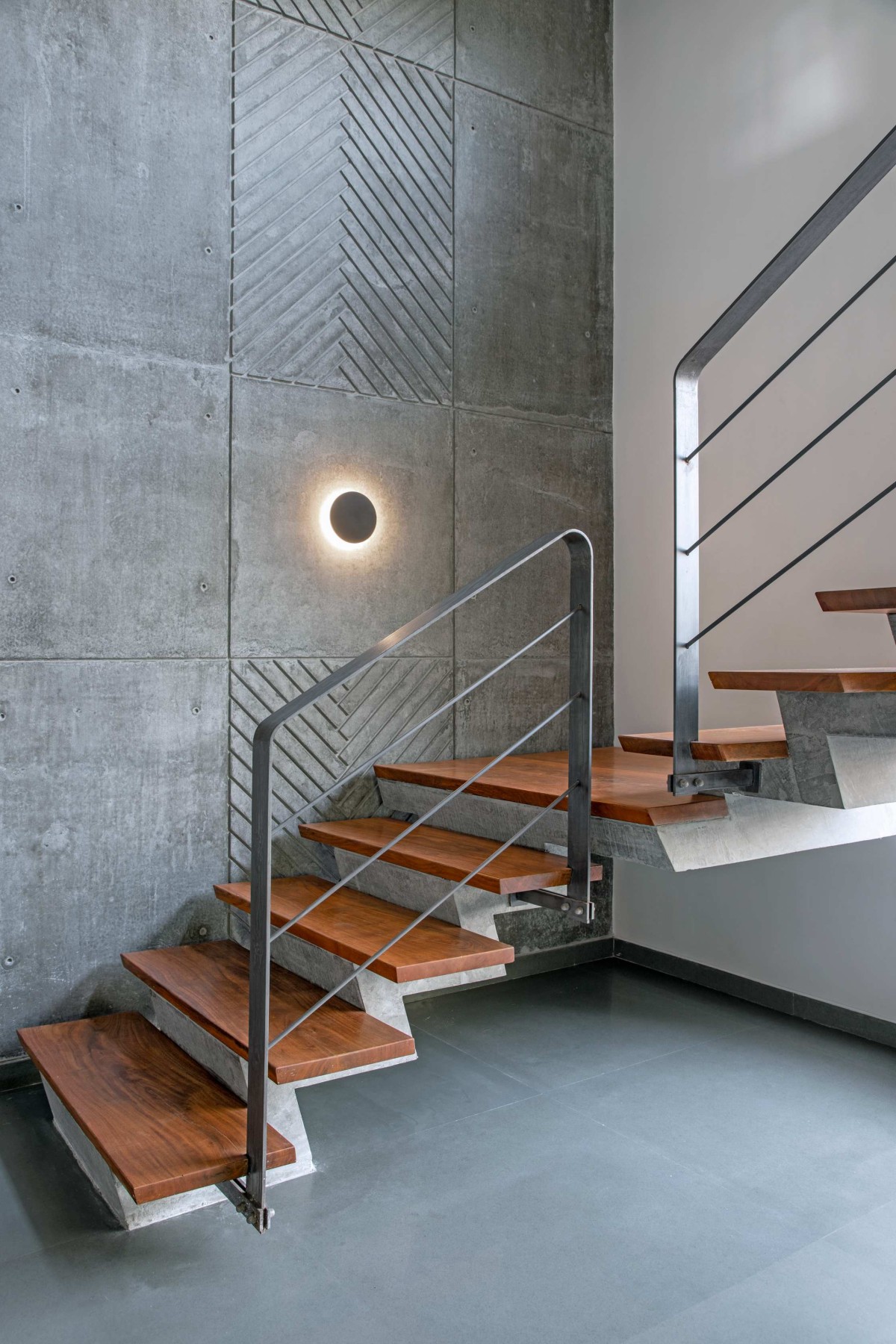 Staircase of Royal Acre Residence by K.N. Associates