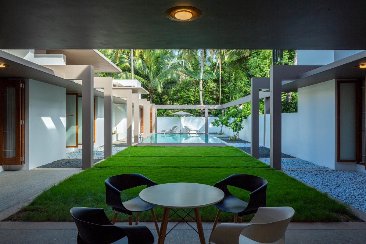 Pool and Patio of The House Within the Grid by LIJO.RENY.architects