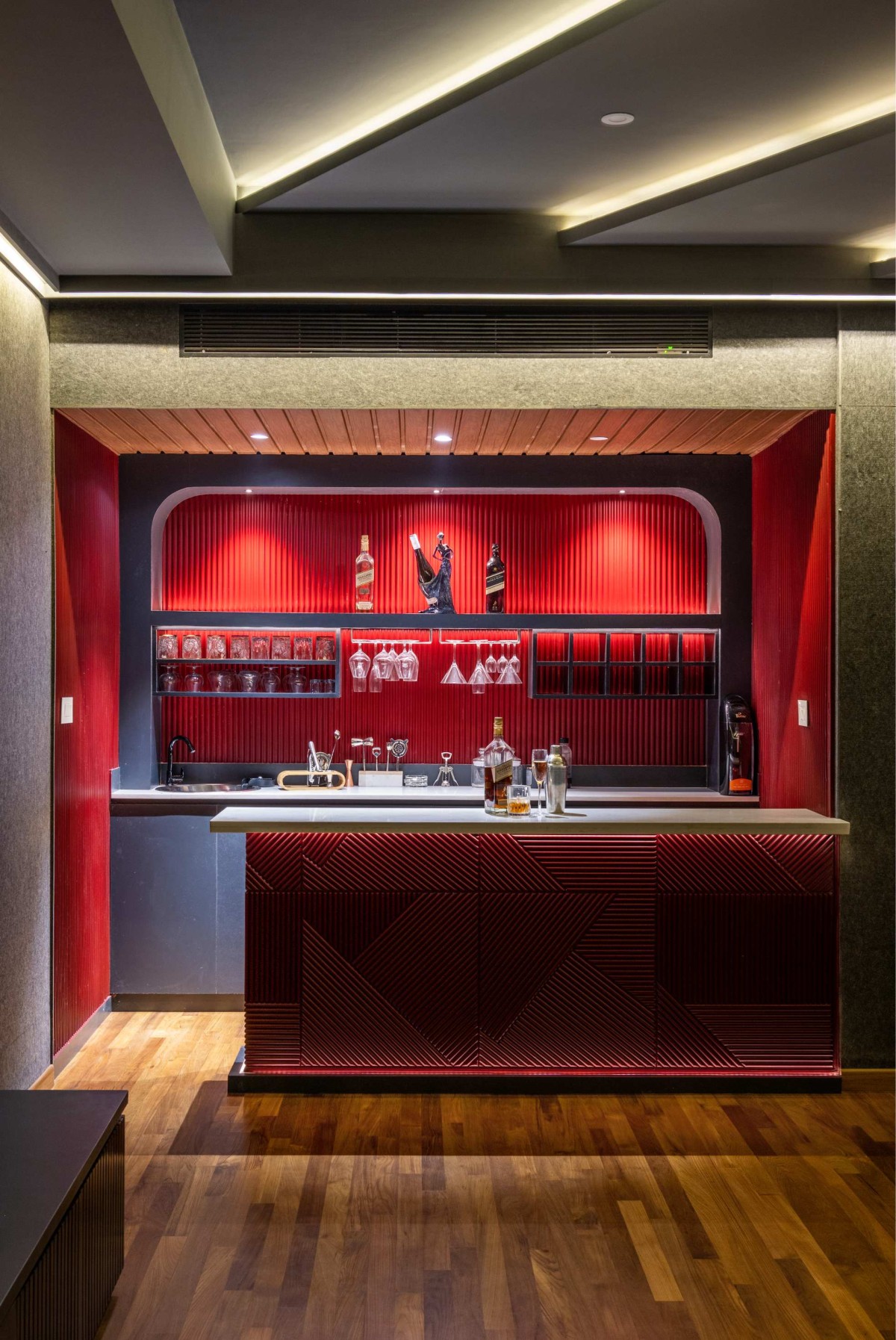 Bar area of The Pravasi Home by Studio Vista Architects