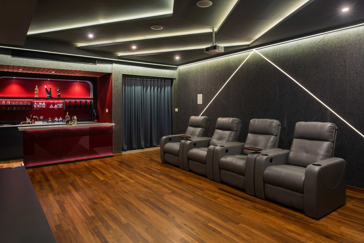 Home theatre of The Pravasi Home by Studio Vista Architects