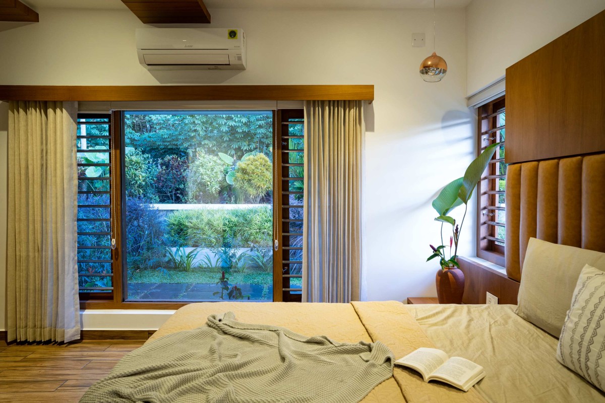 Master Bedroom of Kurumpil Gardens by Nature’s Craft Architectural Studio