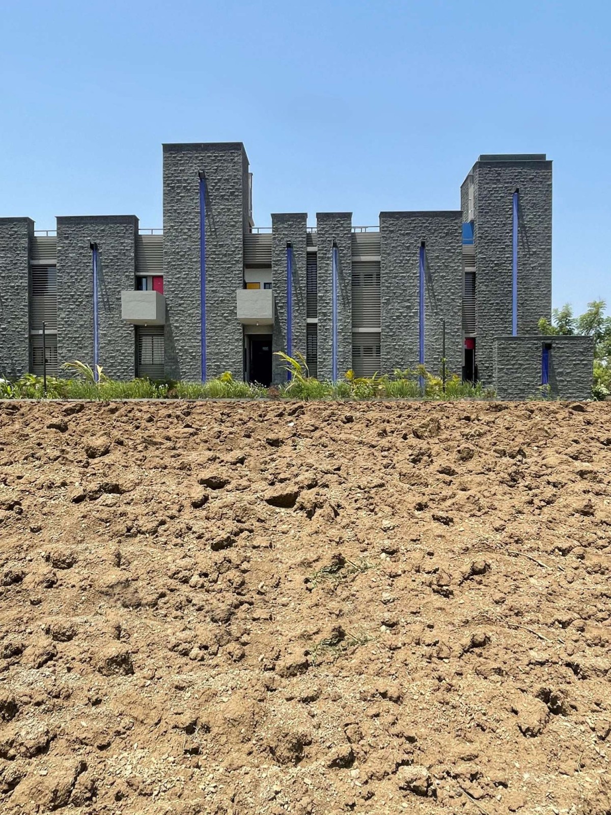 Exterior view of Women Empowerment Shelter by studioPPBA