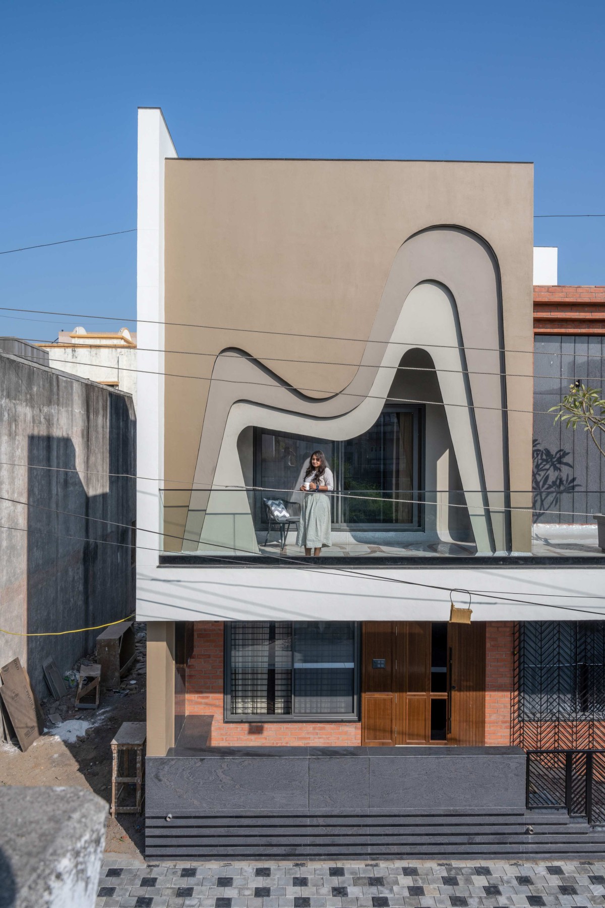 Exterior view of Brick House by Patel Bhavin Architects