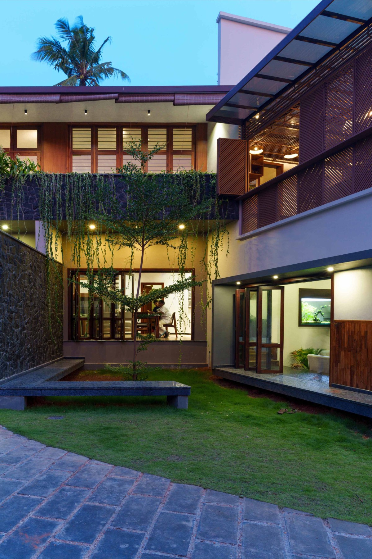 Dusk light exterior view of AANANDHAM – The house of bliss by Urbane Ivy