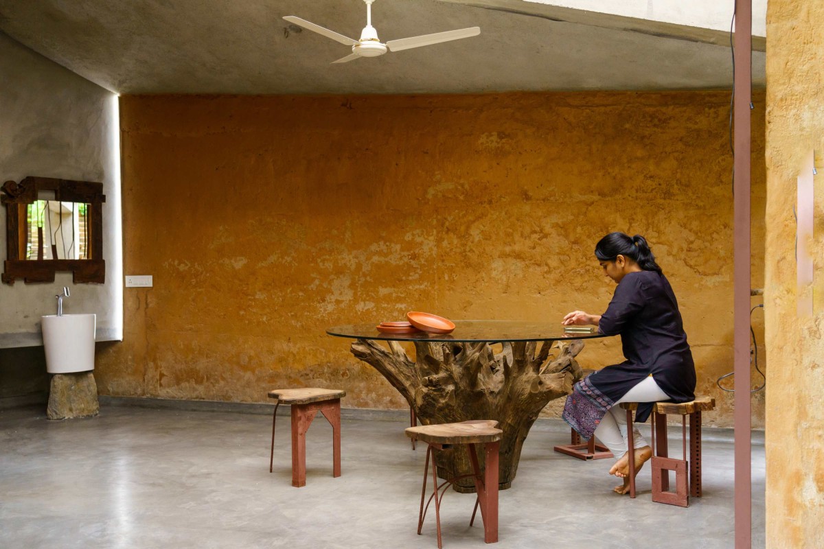 Dining area of Chirath Residence by Wallmakers