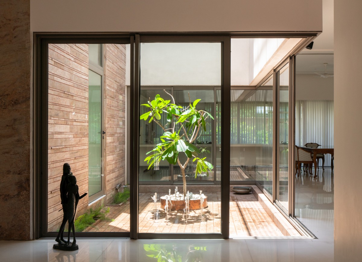 View of courtyard from entrance foyer of Residence 414 by Charged Voids