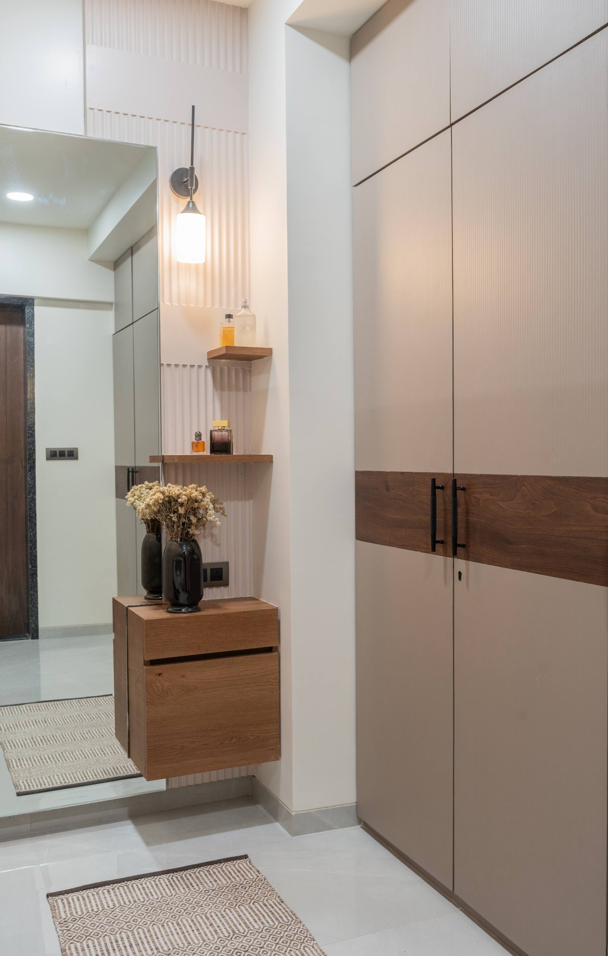 Walk-in-Closet and Dressing area at Master bedroom of Sukoon by the Subtle Studio