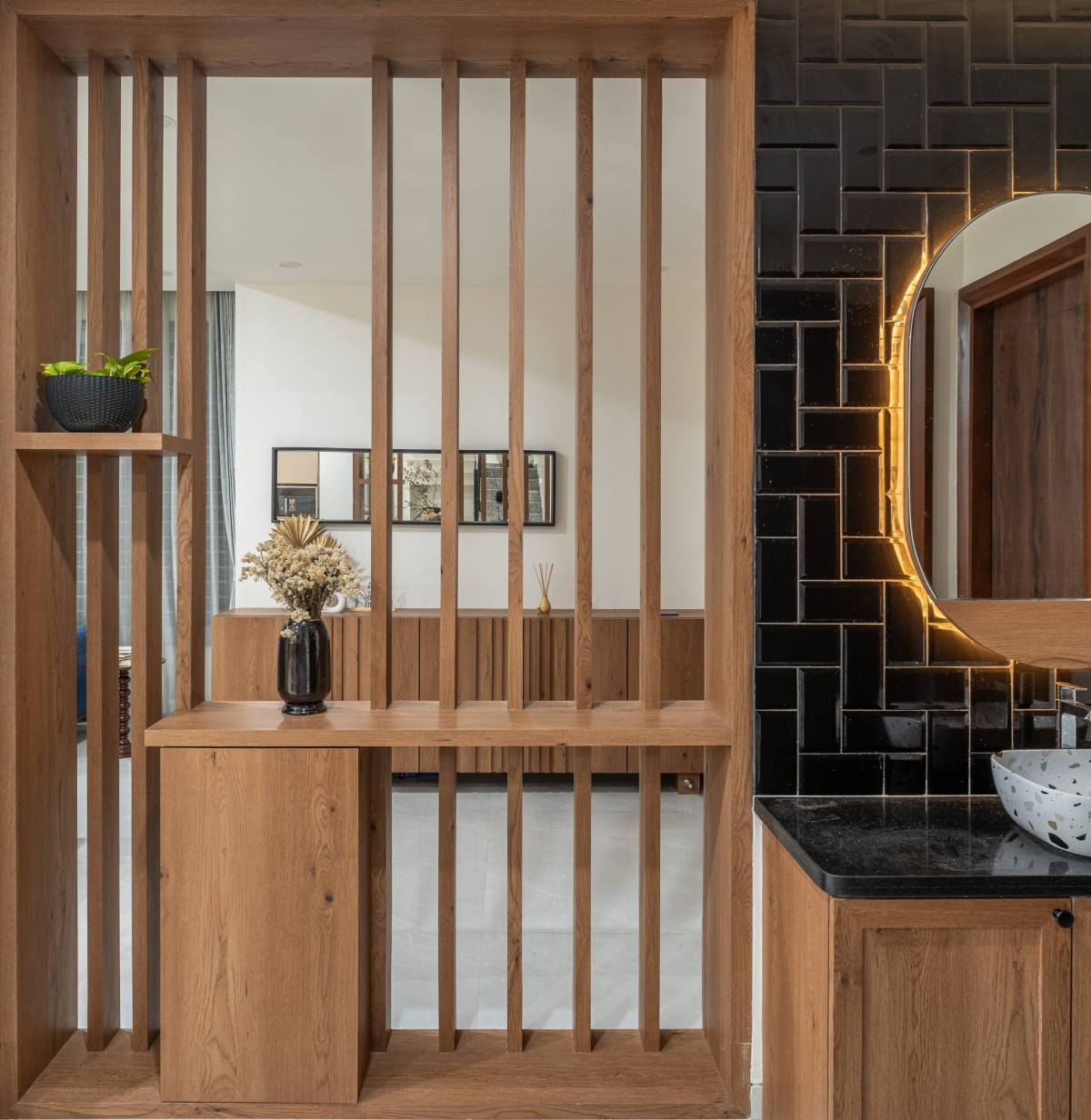 Foyer console through screen of Sukoon by the Subtle Studio