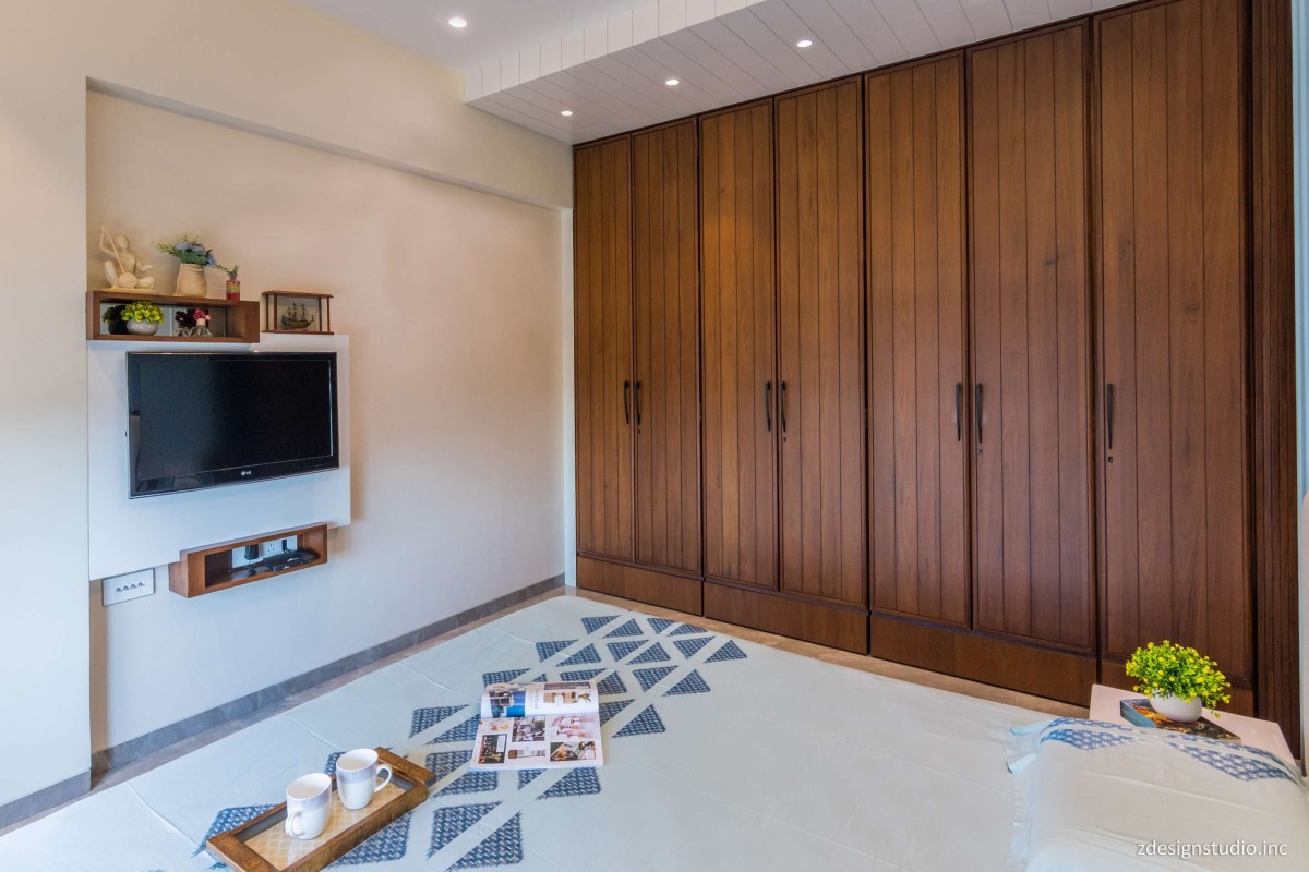 Master bedroom of The Wood House by ZDesign Studio