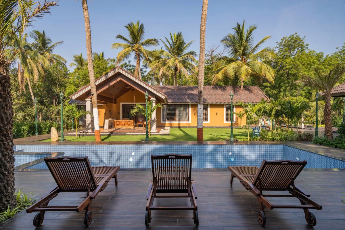 Swimming pool deck area of Veer Farm by Ace Associates Architects