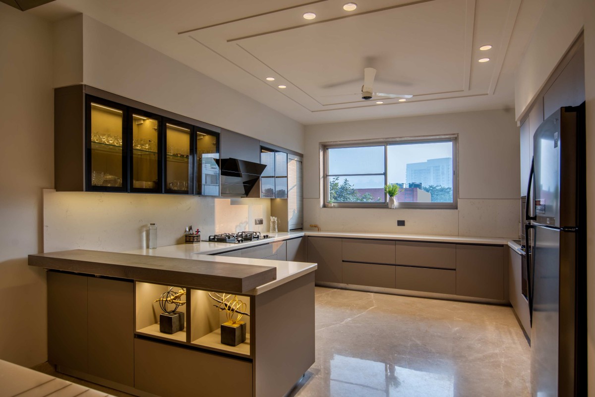 Kitchen of Contemporary House by Orionn Architects