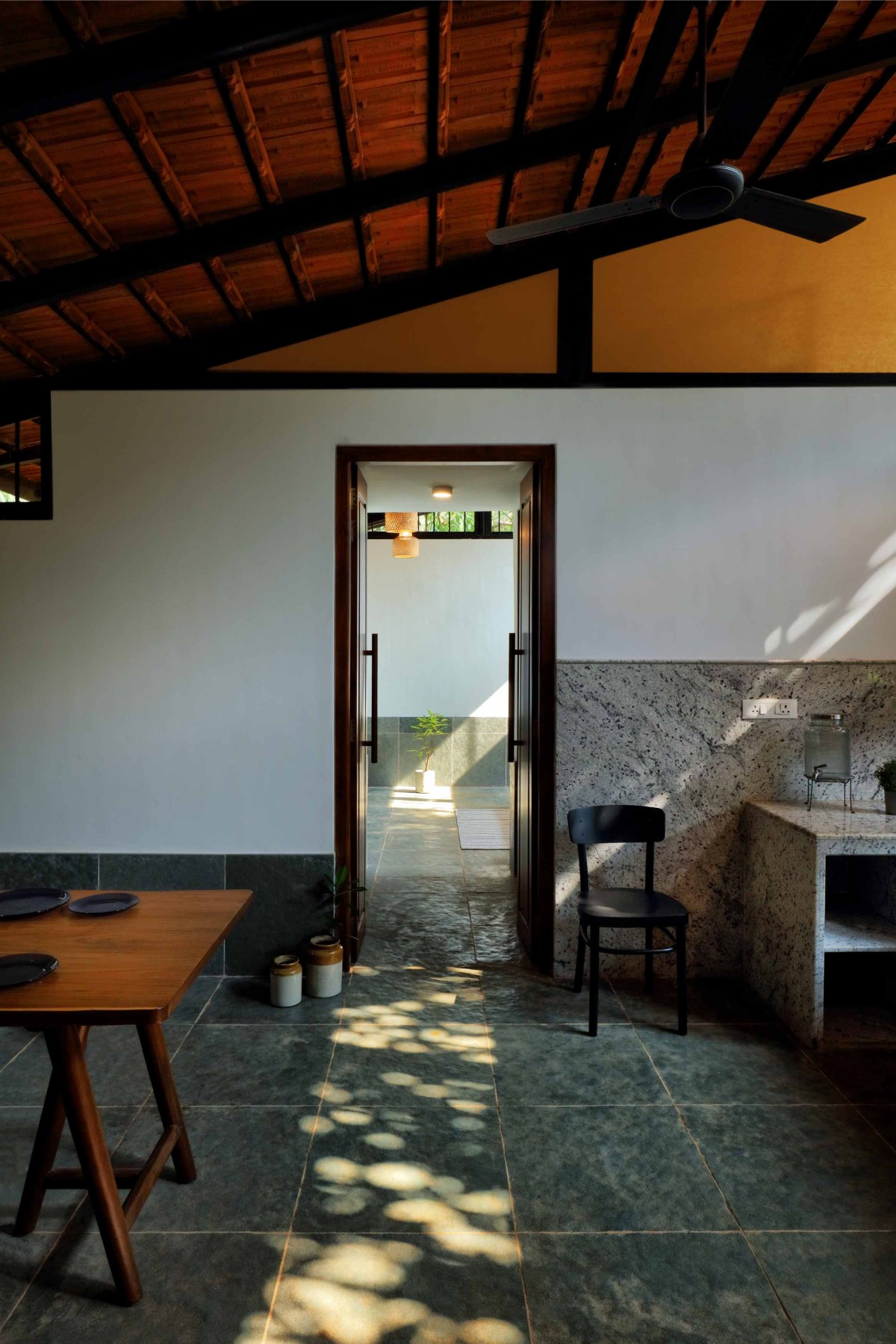 Dining and Kitchen area of Lanja House by Articulated Design Initiative