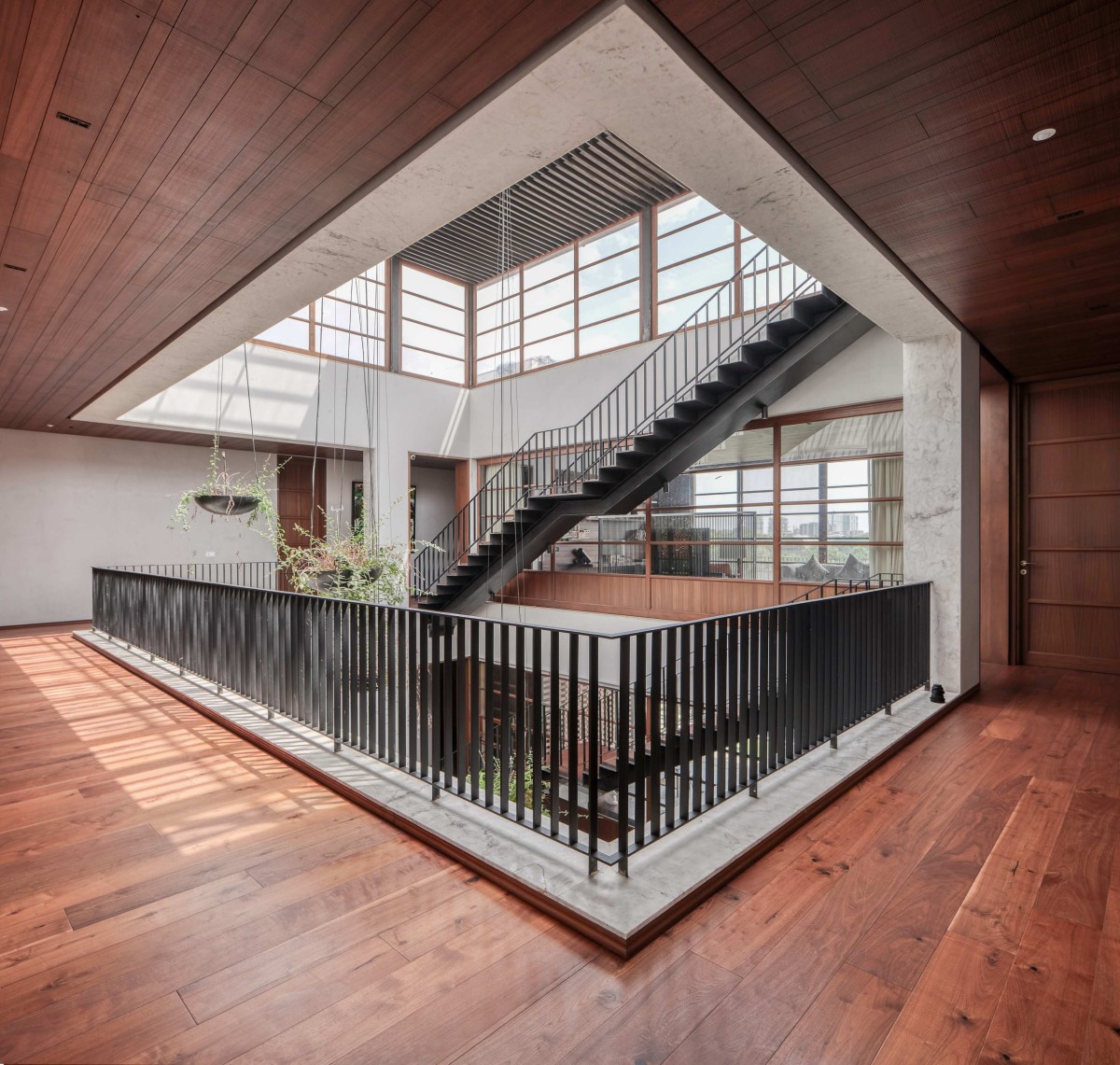 First floor lobby of Ishtika House by SPASM Design Architects