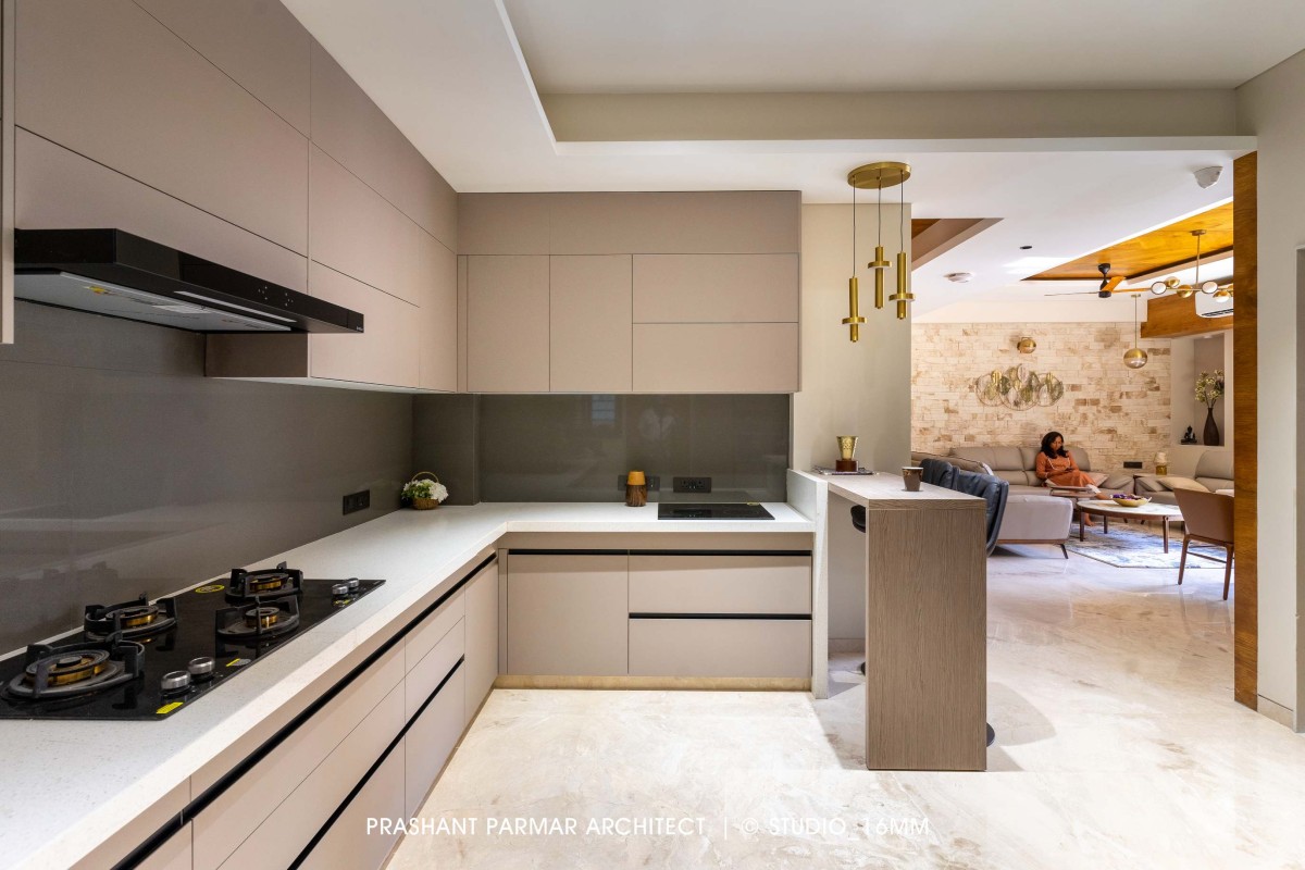 Kitchen of Elevated Compact House by Prashant Parmar Architect  Shayona Consultant