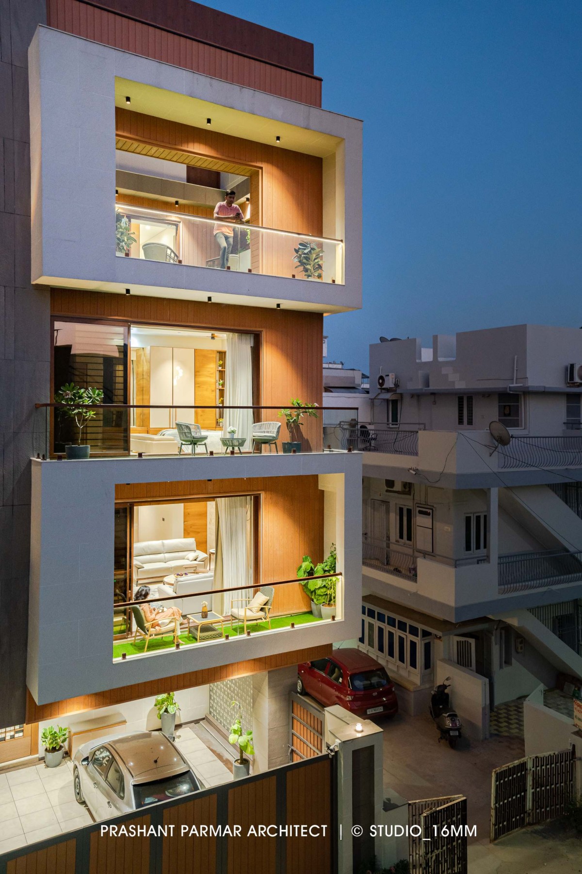 Dusk light exterior view of Elevated Compact House by Prashant Parmar Architect  Shayona Consultant