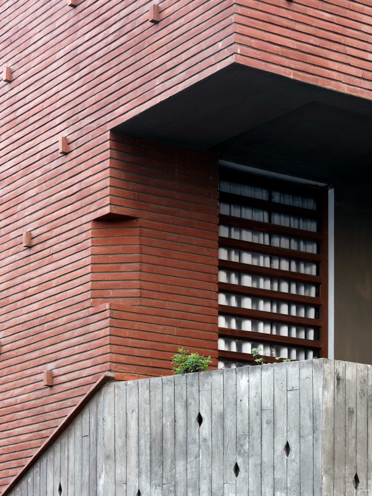 Detailed shot of exterior wall of The Breathing Quadrant by PMA madhushala