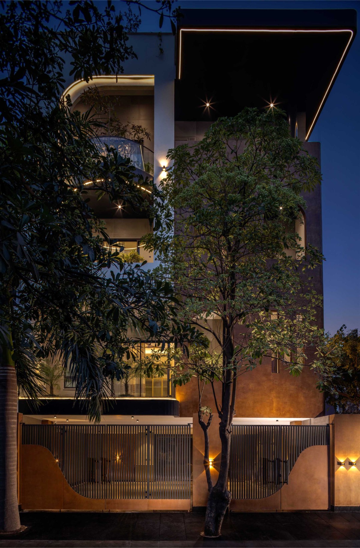 Dusk light exterior view of Surya Niketan 139 by Nadora