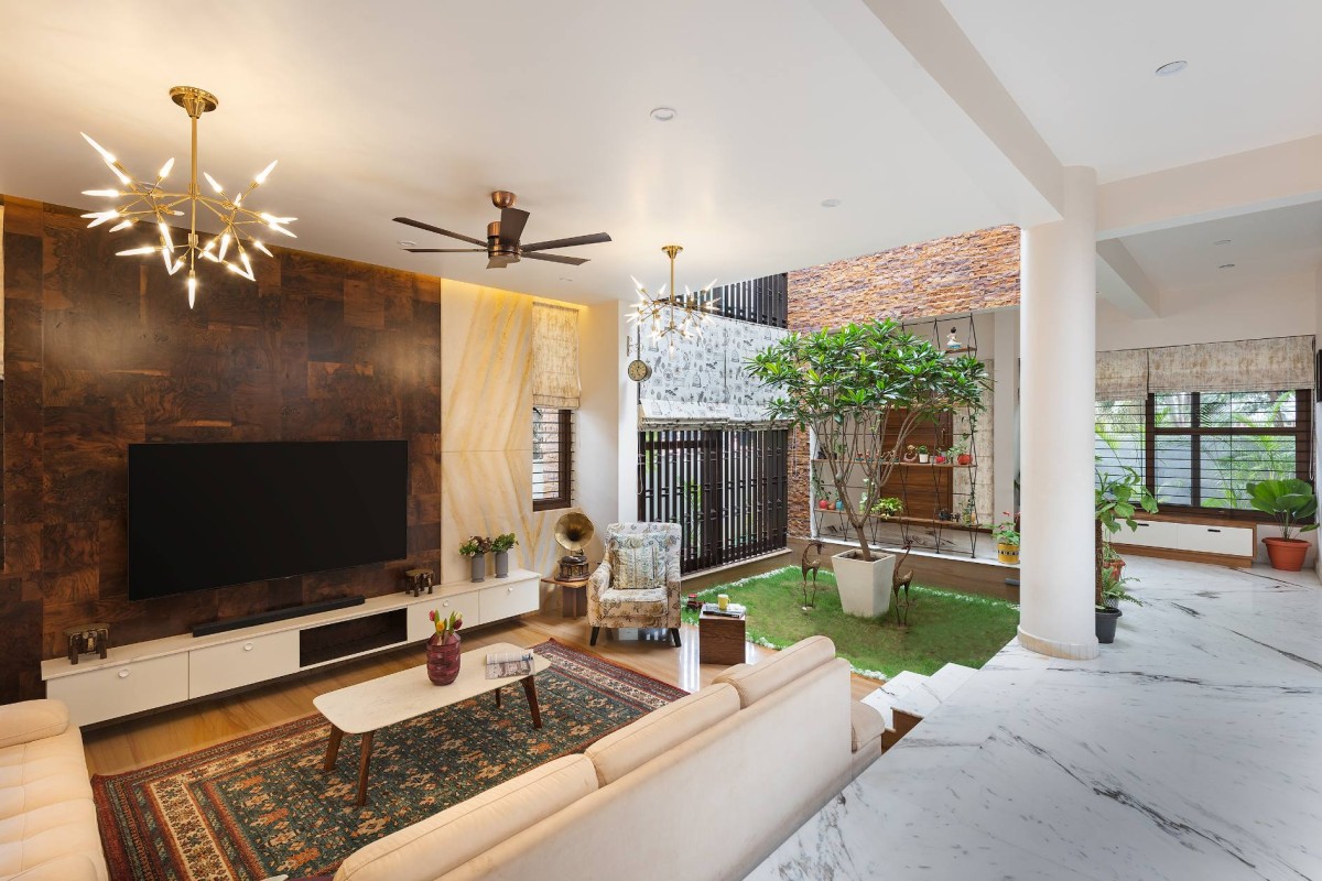 Living room open view of Twin Courtyard House by ID+AS Architects