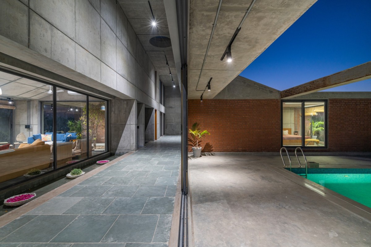 Passage to pool area of Two Bay House by MISA Architects