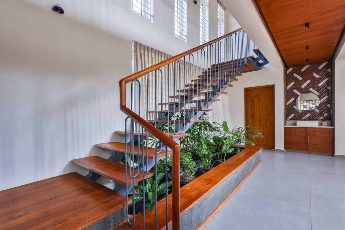 Stairs and interior planter box of Meghamalhar by T Square Architects