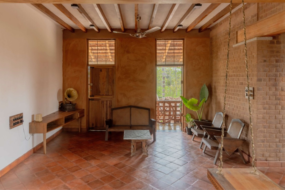 Living room of Brick Manor by Bhutha Earthen Architecture Studio