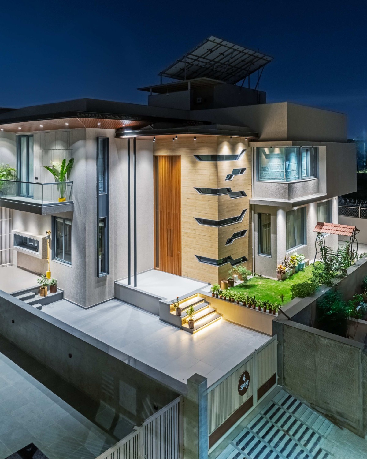 Night shot of Ananta Bungalow by Kalajeet Architects