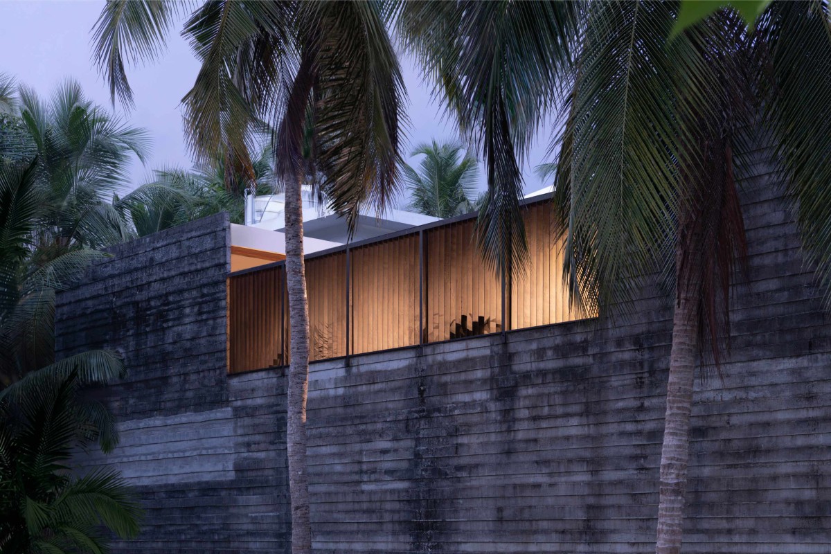 Night shot of exterior view of The Wall of Being by Evolving Radical Aesthetics