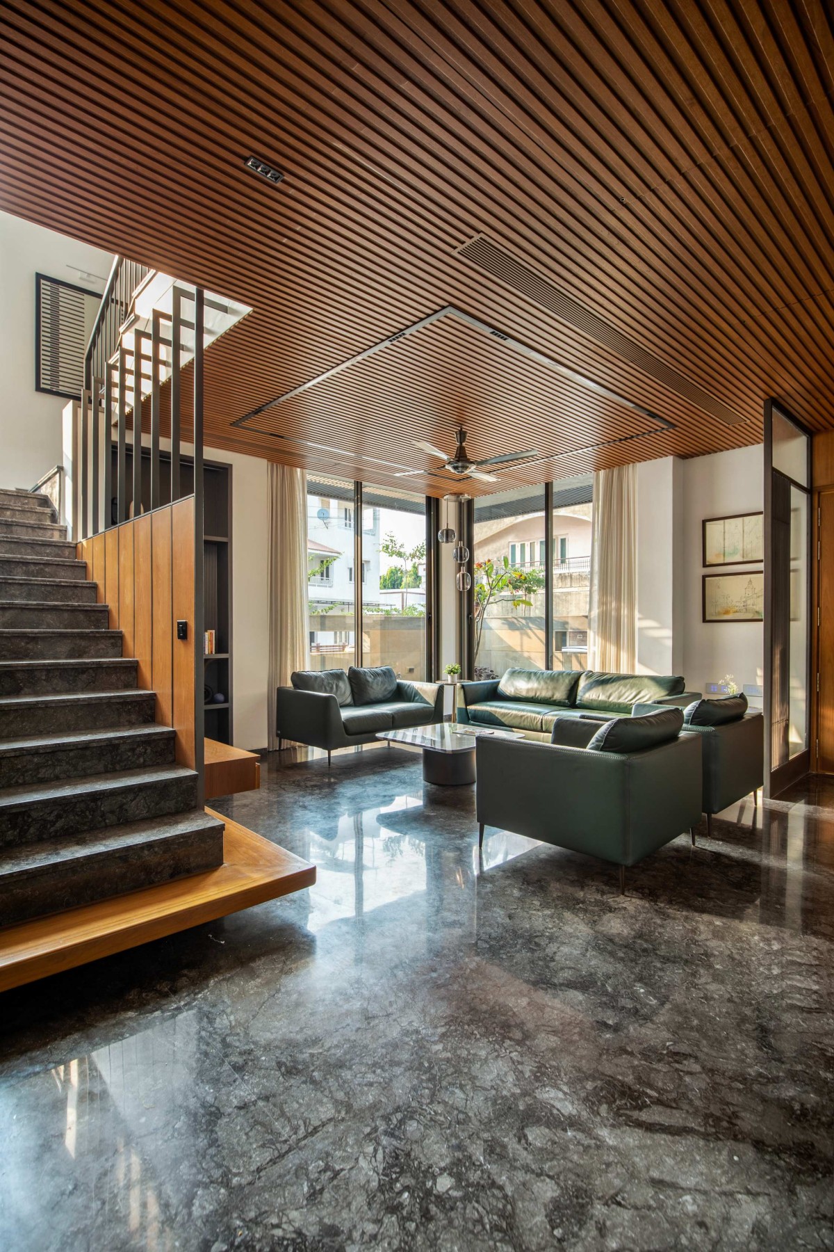 Staircase and Living room of Manilaxmi by I K Architects