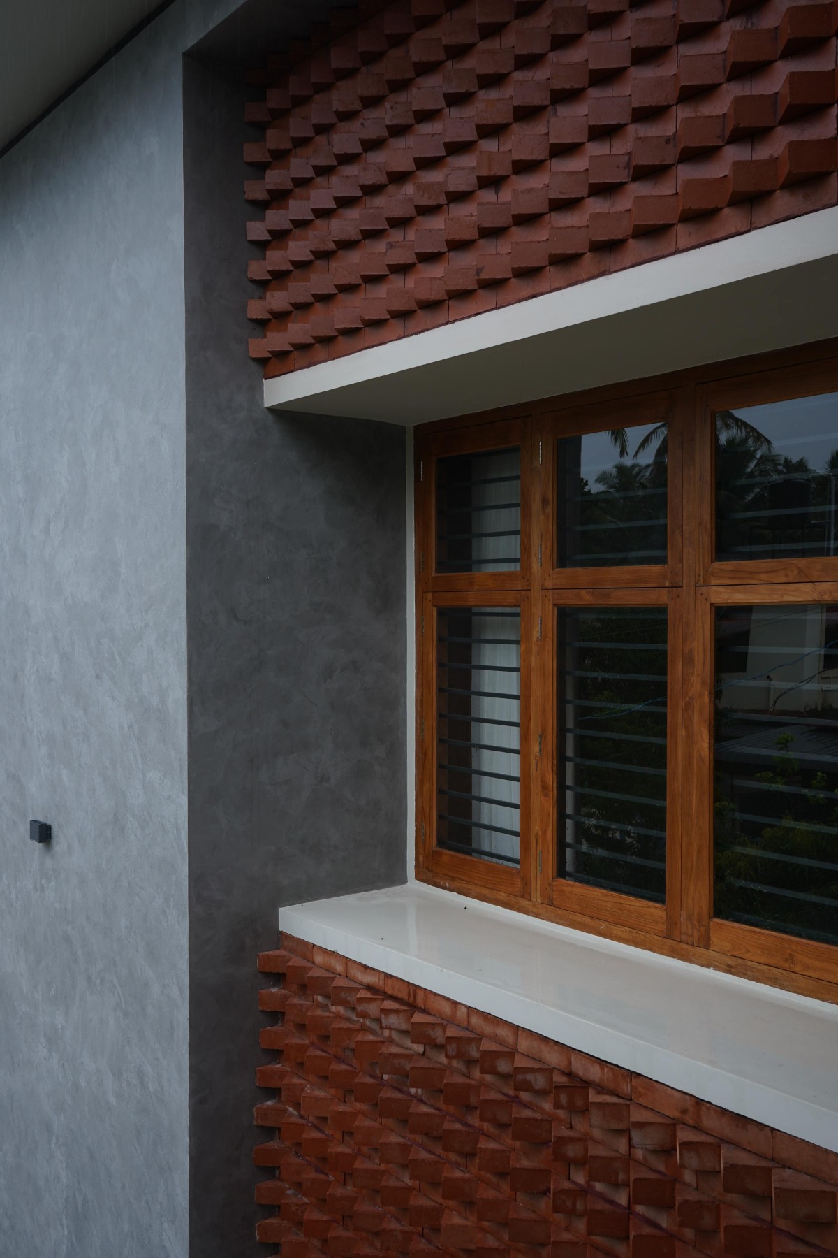 Detailed shot of exterior wall of Ilav by Tropical Tones