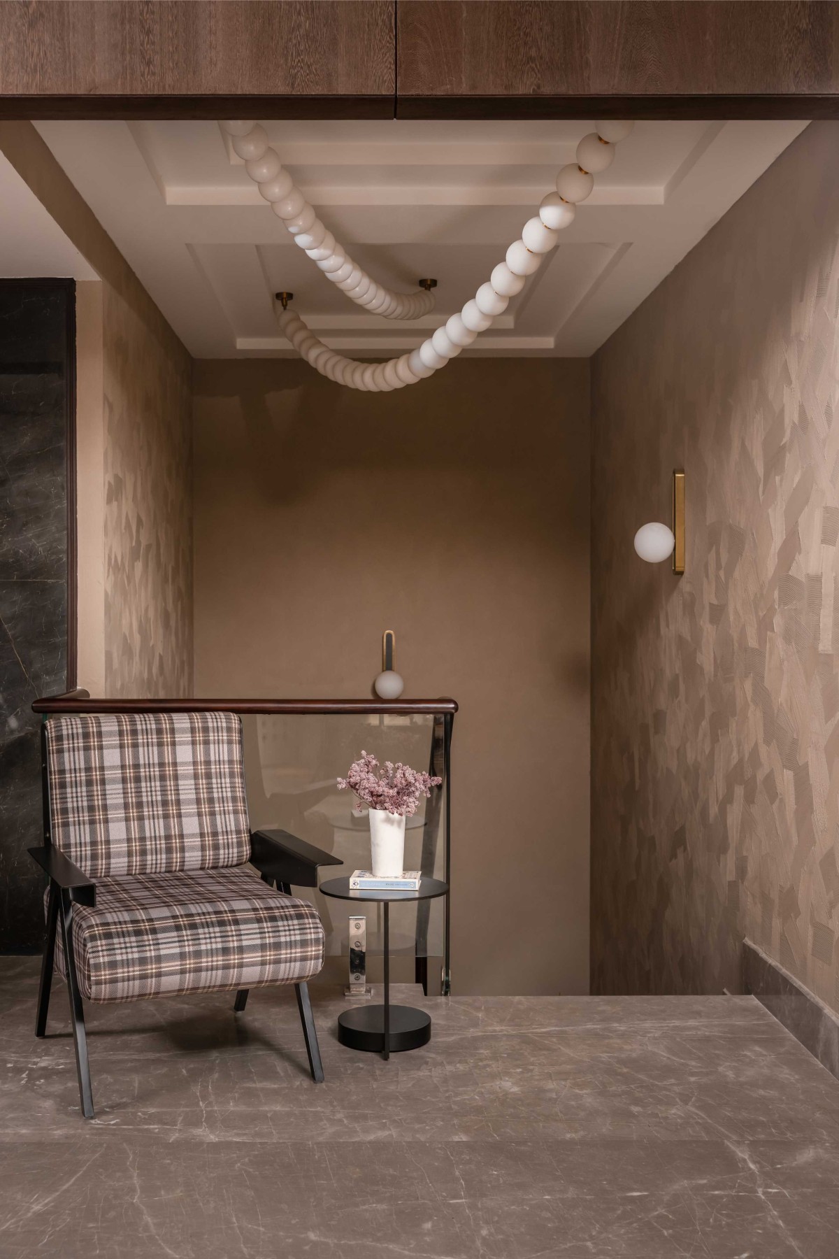 Seating area and Ceiling view of Cirque House by The Melange Studio