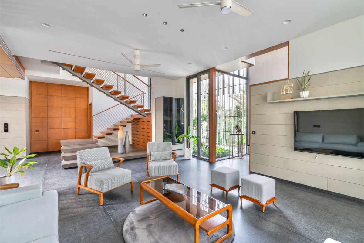 Living room of The Concrete Tree House by Architects at Work