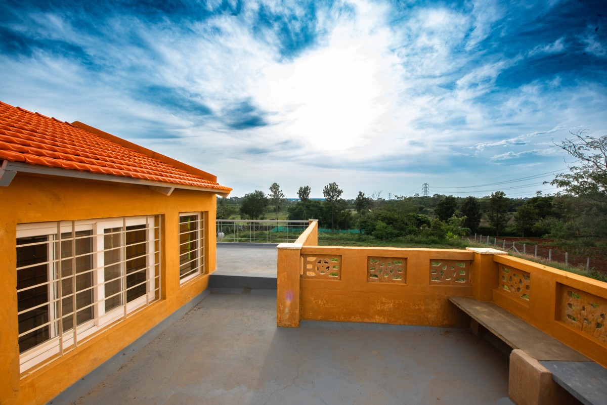 Terrace of Composite Earth Farmhouse by Studio Verge