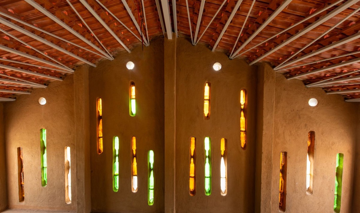 Detailed shot of roof and wall of Composite Earth Farmhouse by Studio Verge