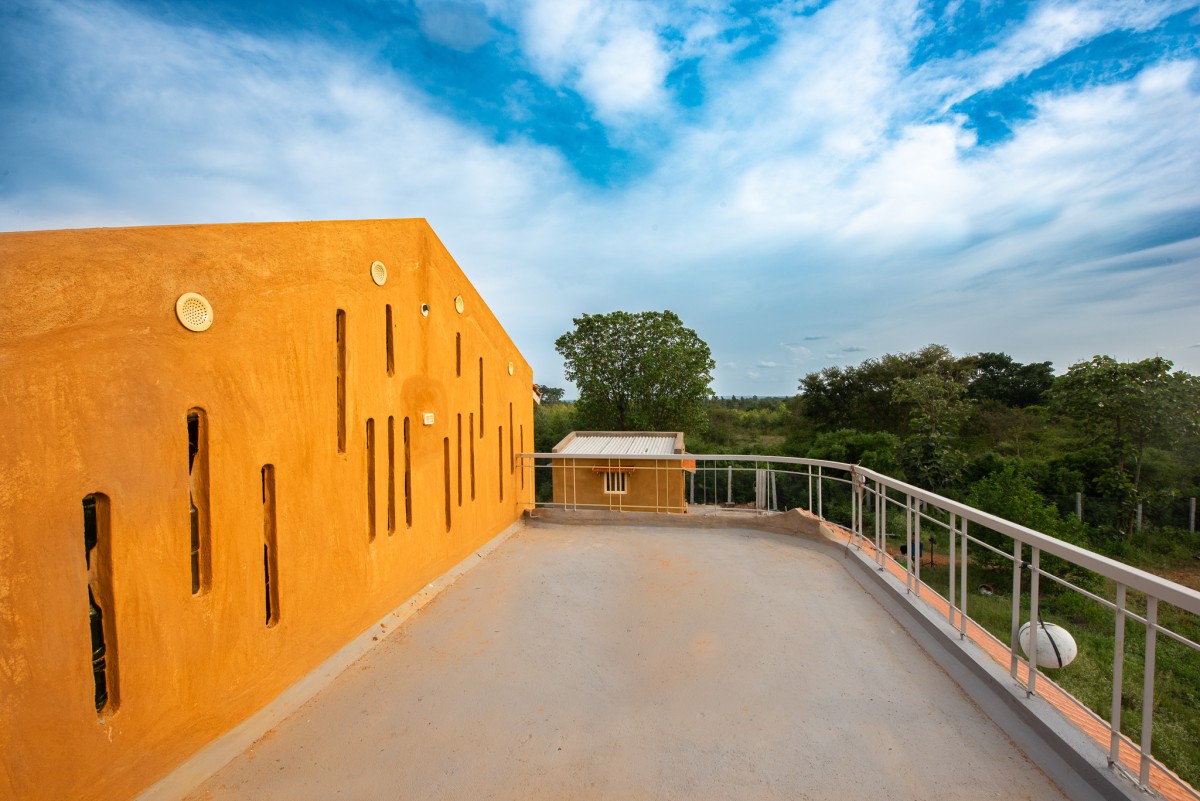 Terrace of Composite Earth Farmhouse by Studio Verge