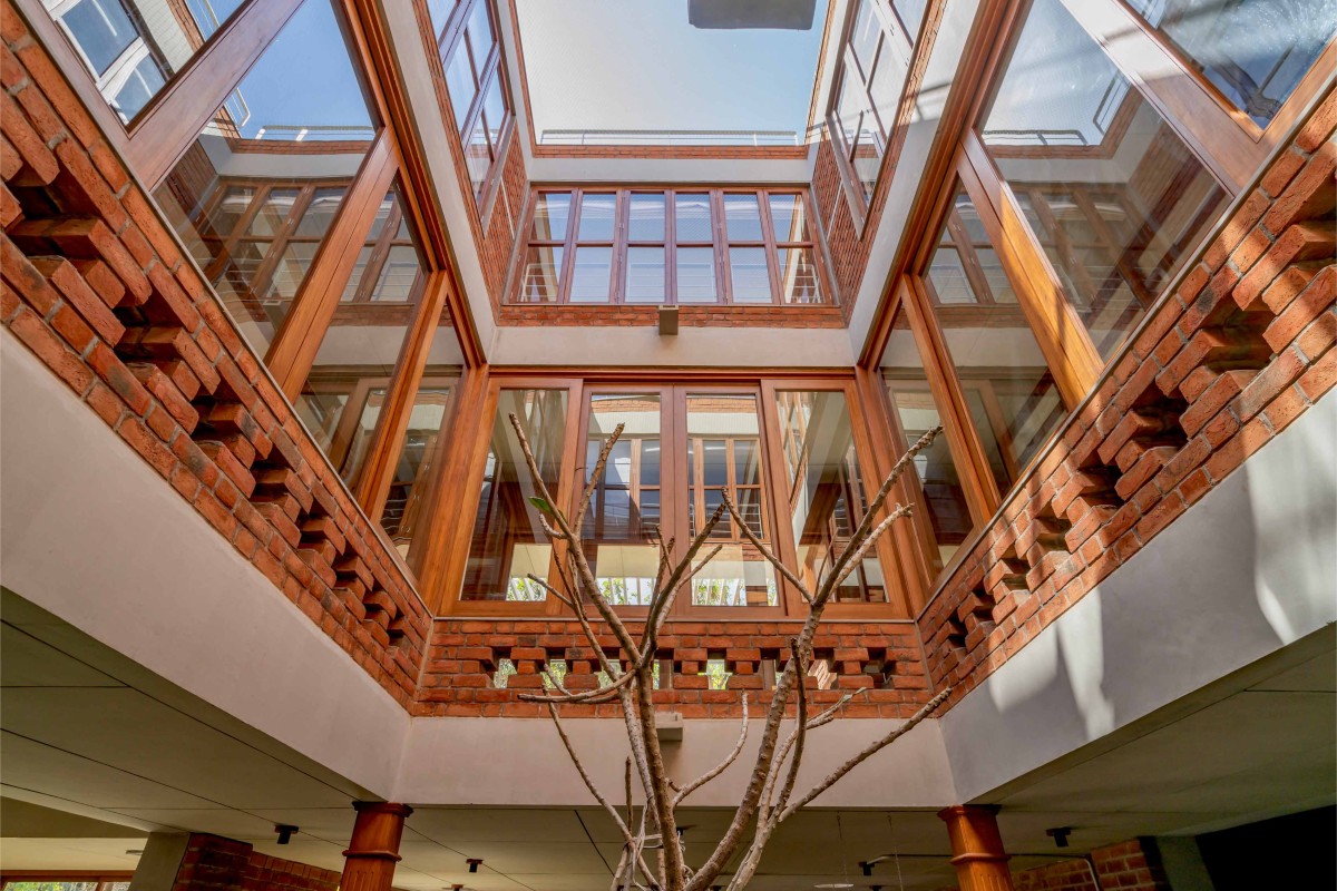 Open-to-sky courtyard of The Maze House by MISA Architects