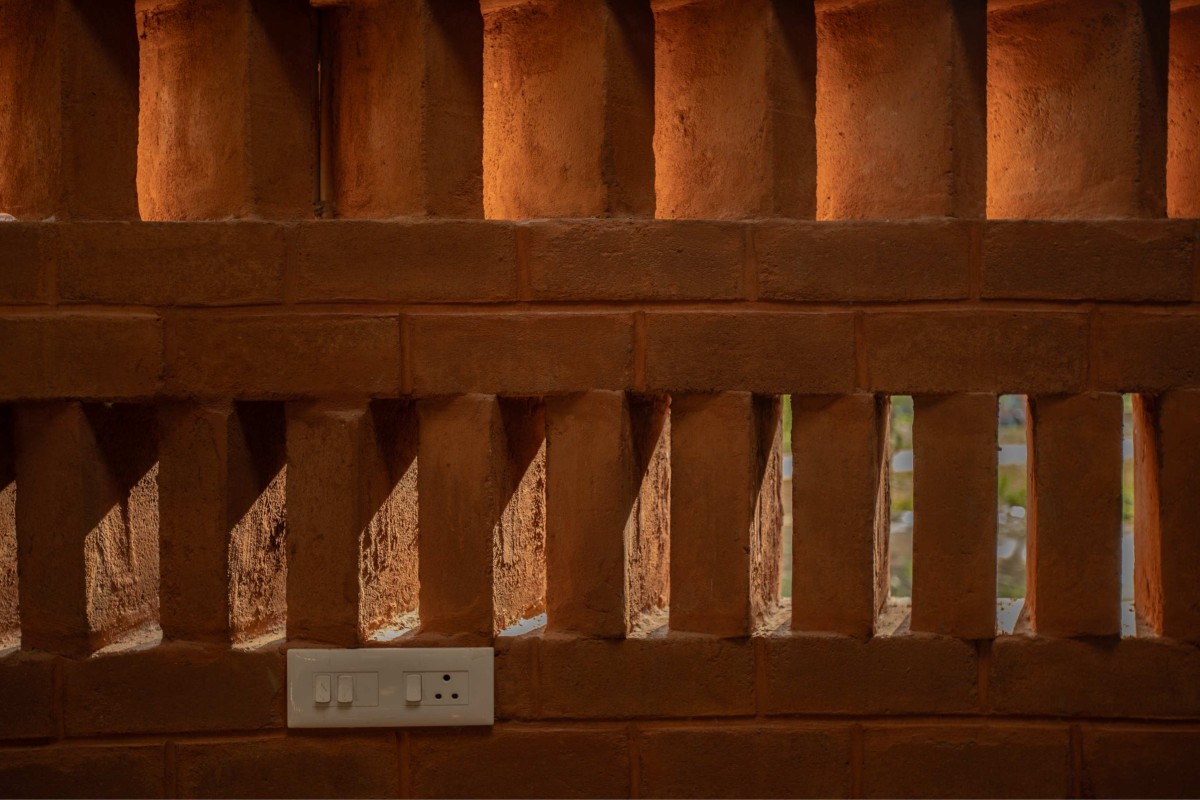 Detailed shot of brick wall of Aadhi Residence by RP Architects