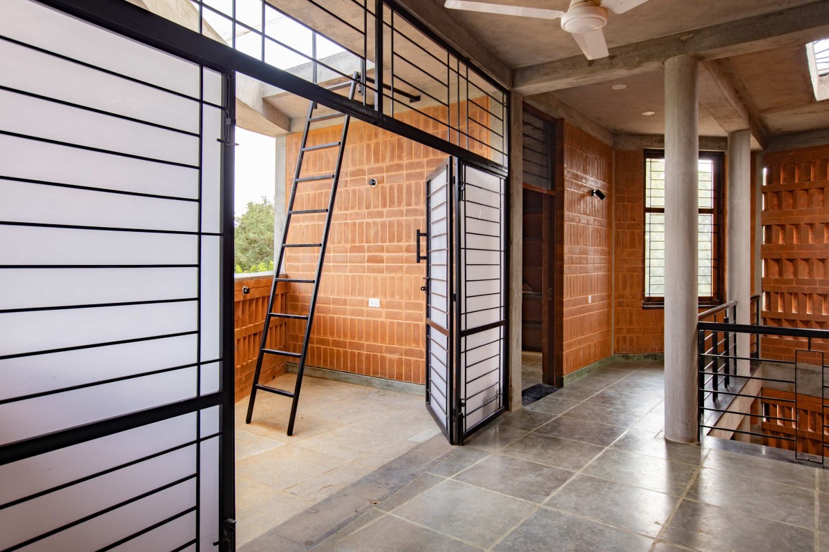 Passage to semi-open terrace of Aadhi Residence by RP Architects