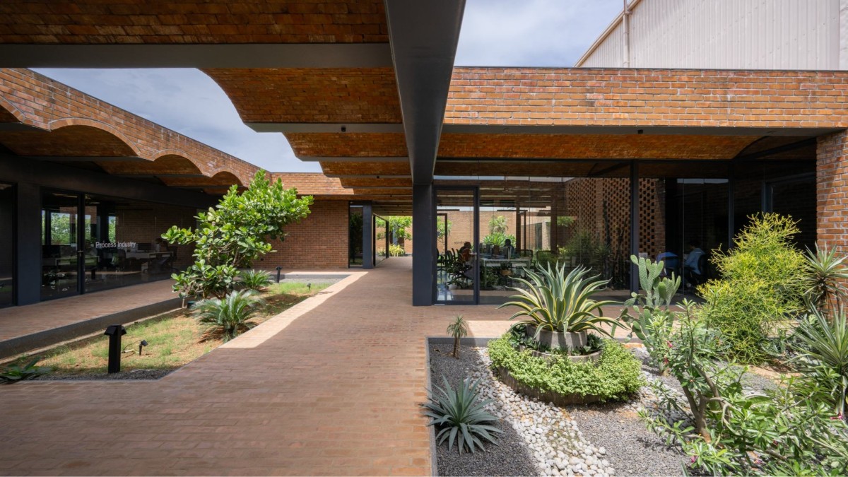 Passage to courtyard of Metallic Bellows by KSM Architecture